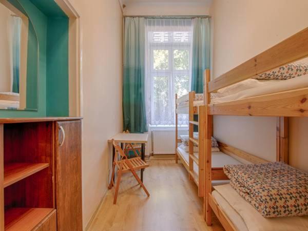 Camera Quadrupla con Bagno in Comune